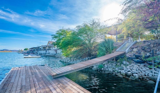 dock area with a water view