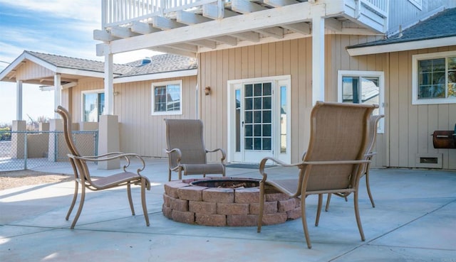 view of patio with an outdoor fire pit