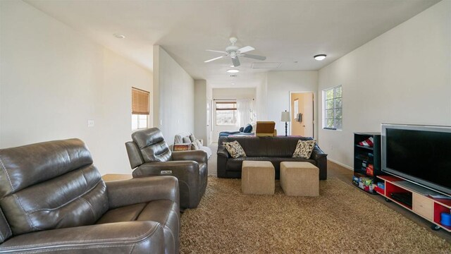 living room featuring ceiling fan