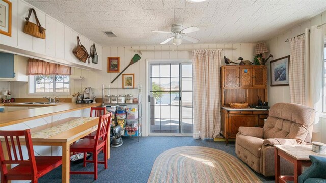 2564 Walters Camp Rd, Winterhaven, CA 92283 - dining space featuring ceiling fan and carpet flooring