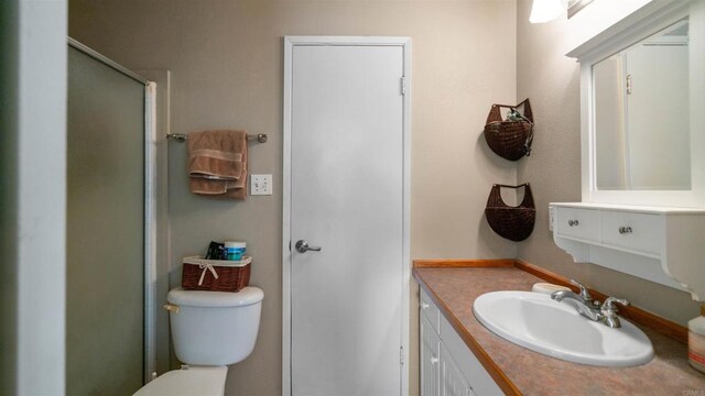2564 Walters Camp Rd, Winterhaven, CA 92283 - bathroom with vanity, toilet, and an enclosed shower