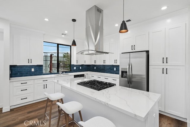 kitchen with stainless steel refrigerator with ice dispenser, island exhaust hood, a kitchen island, and pendant lighting