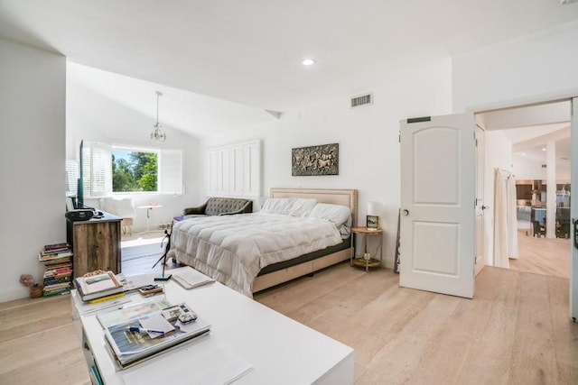 bedroom featuring recessed lighting, visible vents, lofted ceiling, and light wood-style floors