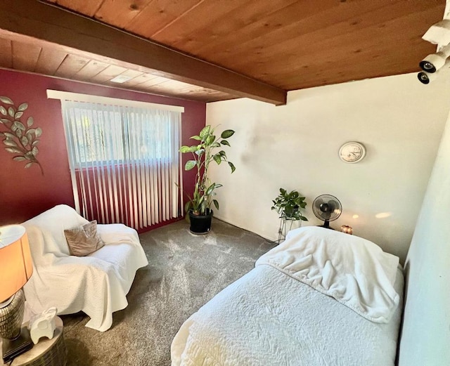 carpeted bedroom with beam ceiling and wooden ceiling