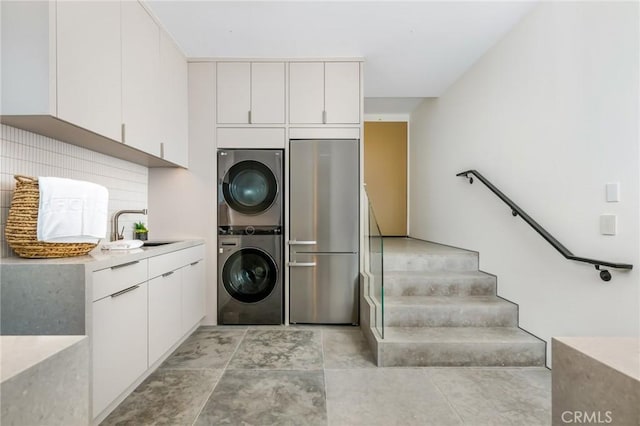 433 Harbor Island Dr, Newport Beach, CA 92660 - laundry area with stacked washer / dryer and a sink