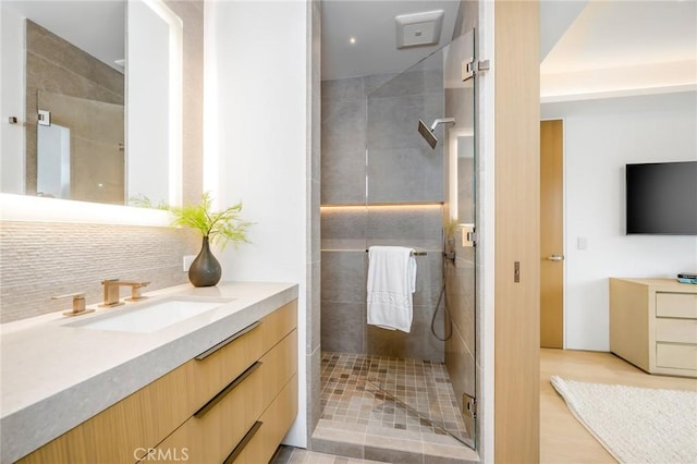 433 Harbor Island Dr, Newport Beach, CA 92660 - full bath featuring vanity, a tile shower, and backsplash