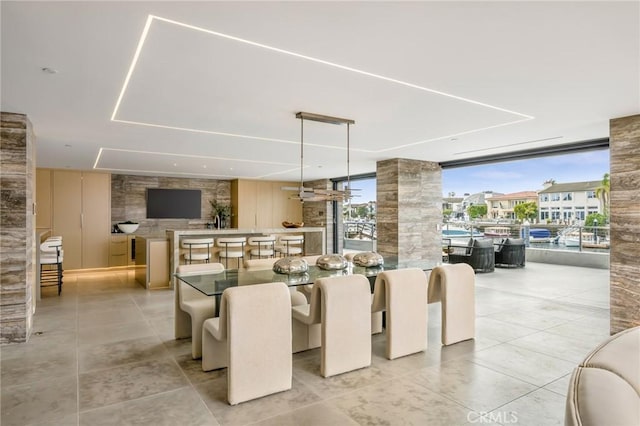 dining area with floor to ceiling windows