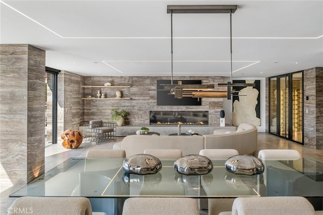 433 Harbor Island Dr, Newport Beach, CA 92660 - dining room with a glass covered fireplace and expansive windows