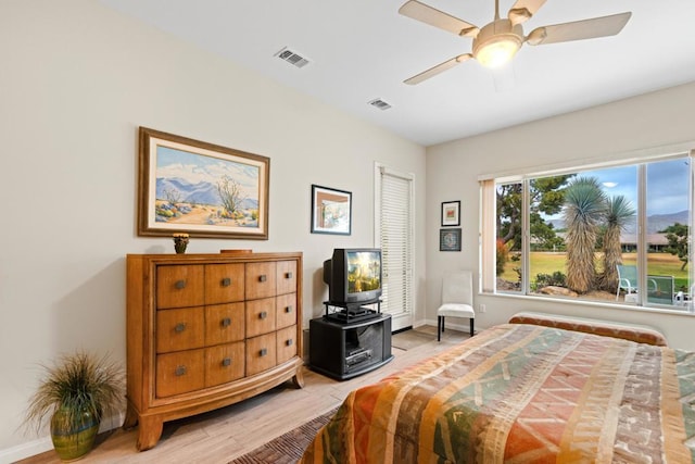 bedroom featuring ceiling fan and light wood-type flooring