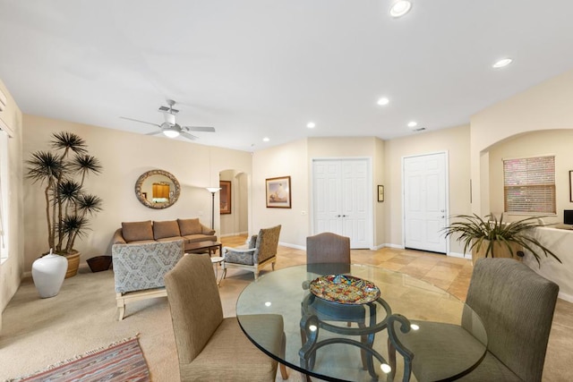 living room featuring ceiling fan