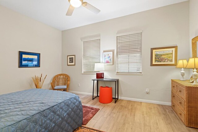 bedroom featuring ceiling fan and light hardwood / wood-style floors