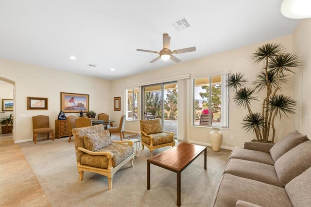 living room featuring ceiling fan