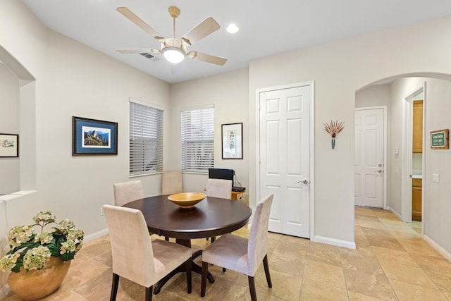 dining room featuring ceiling fan