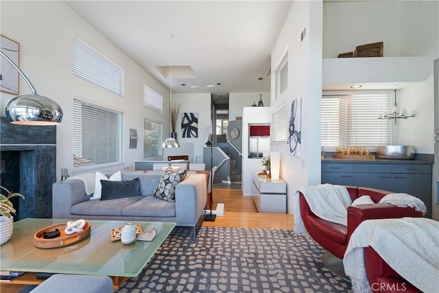 living room featuring a high ceiling