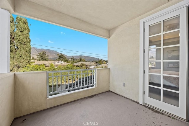 balcony featuring a mountain view