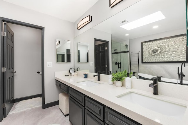 bathroom with walk in shower, vanity, and a skylight