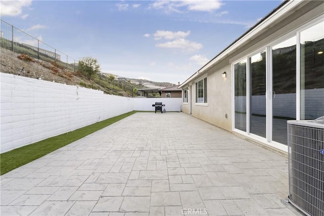 view of patio featuring central air condition unit