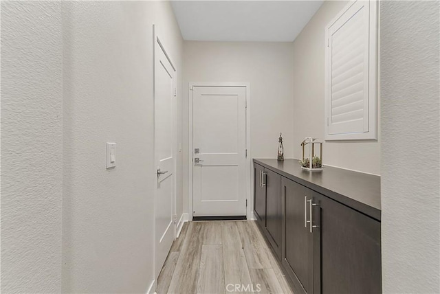 hallway featuring light hardwood / wood-style floors