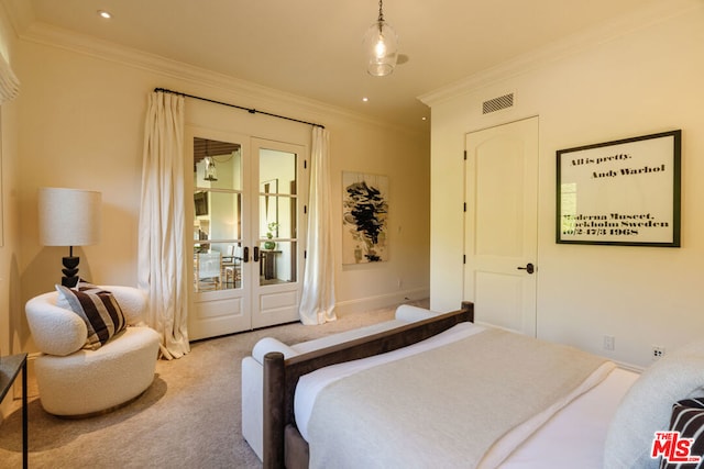 bedroom with carpet, french doors, and crown molding