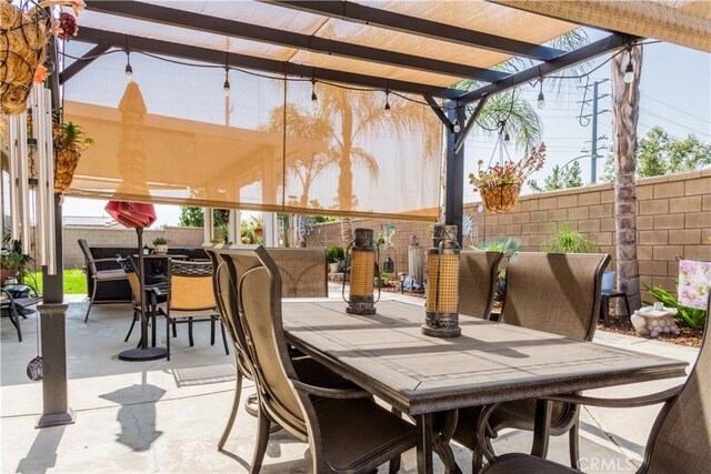 view of patio / terrace featuring a pergola