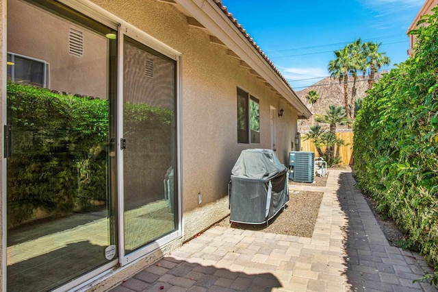 view of patio with cooling unit