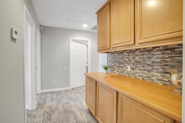 hallway featuring light hardwood / wood-style flooring