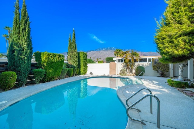 view of pool featuring a mountain view