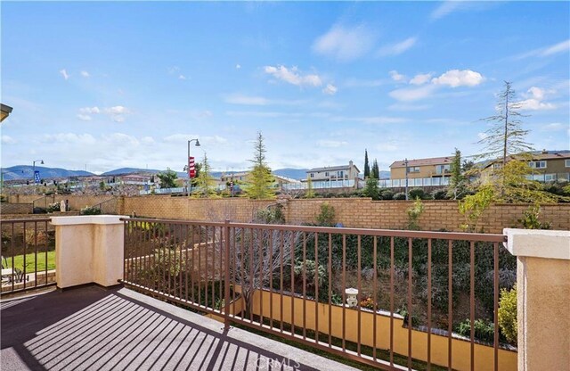 balcony featuring a mountain view