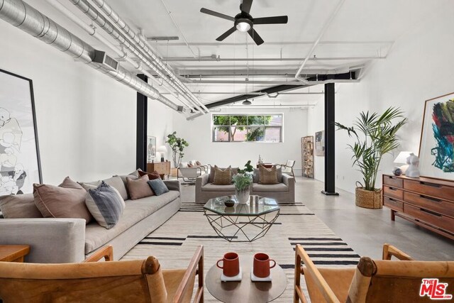 living room featuring ceiling fan