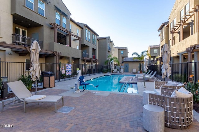 view of swimming pool featuring a patio