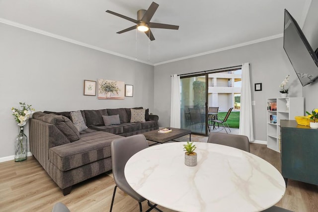 dining area featuring ceiling fan, ornamental molding, and light hardwood / wood-style floors