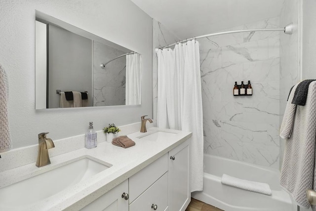 bathroom with vanity and shower / bath combination with curtain