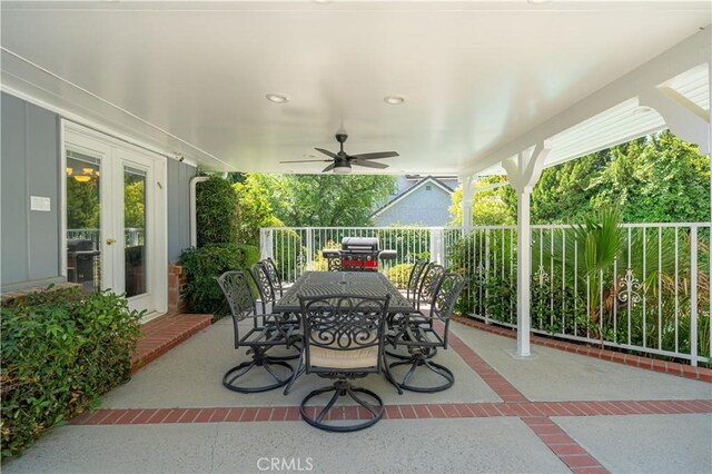 view of patio / terrace with ceiling fan and a grill