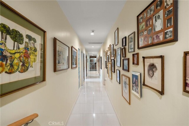 hallway with light tile patterned floors