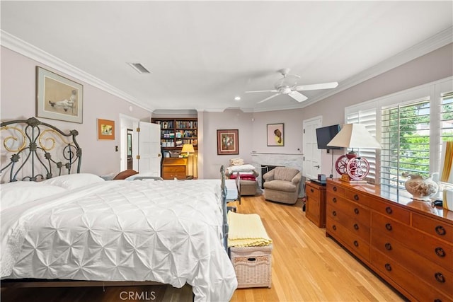 bedroom with ceiling fan, ornamental molding, and light wood-type flooring