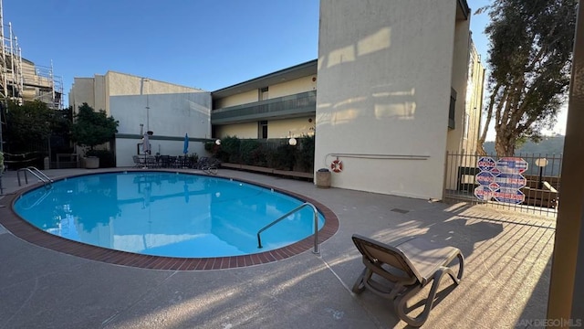 view of pool with a patio area