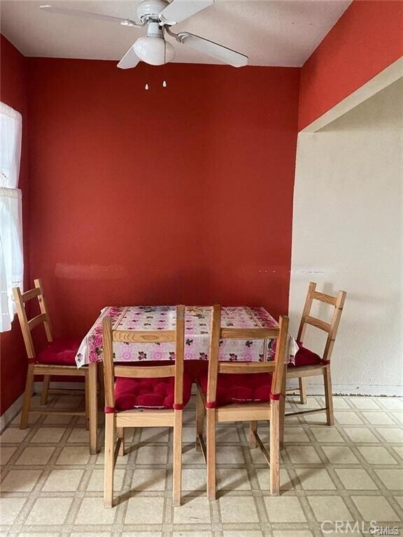 dining area with ceiling fan