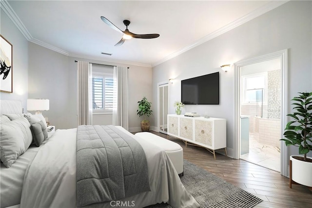 bedroom featuring ceiling fan, connected bathroom, dark hardwood / wood-style flooring, and ornamental molding