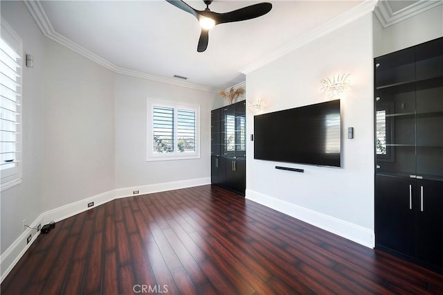 unfurnished living room featuring ceiling fan, ornamental molding, and dark hardwood / wood-style floors