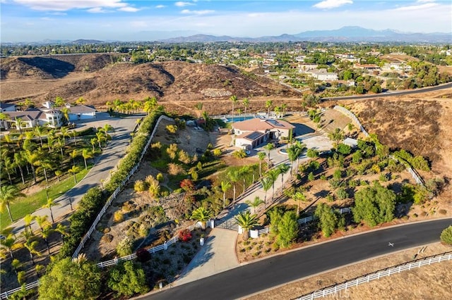 drone / aerial view featuring a mountain view