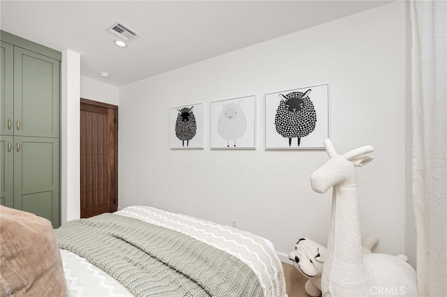 bedroom featuring wood-type flooring