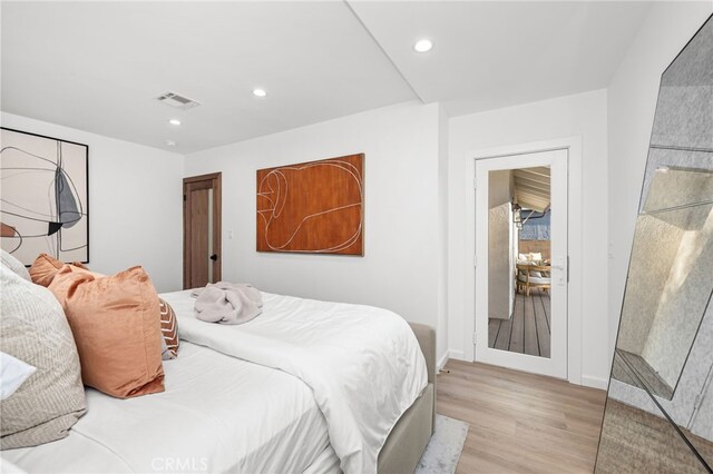 bedroom featuring light hardwood / wood-style flooring