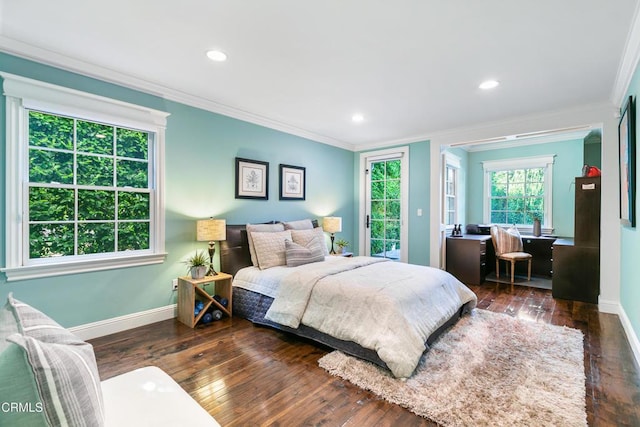 bedroom with dark wood-type flooring and ornamental molding