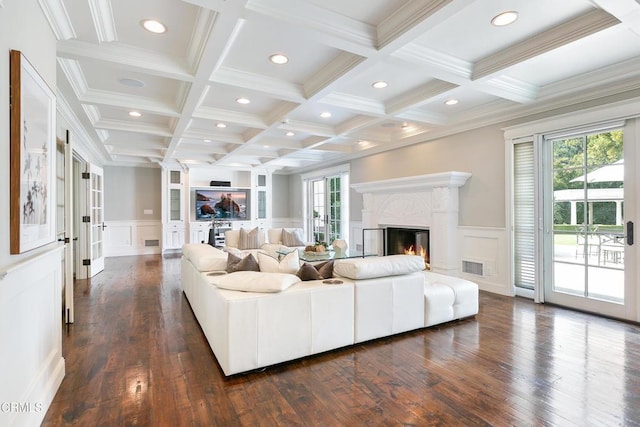 living room featuring dark hardwood / wood-style floors, ornamental molding, coffered ceiling, and beamed ceiling