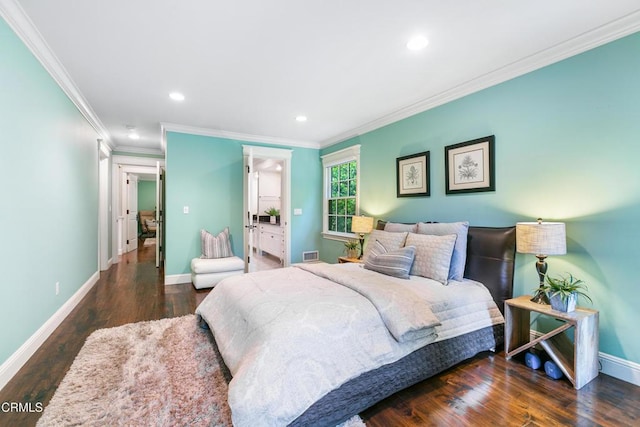 bedroom featuring dark hardwood / wood-style floors and ornamental molding