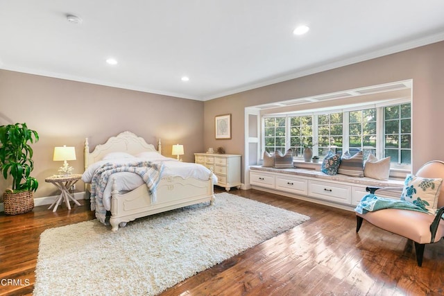 bedroom with dark wood-type flooring and ornamental molding