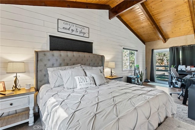 bedroom with beamed ceiling, wood walls, and wooden ceiling