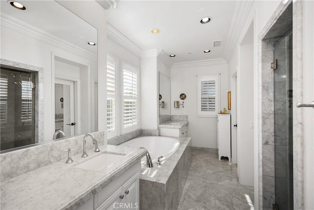 bathroom featuring independent shower and bath, ornamental molding, and vanity