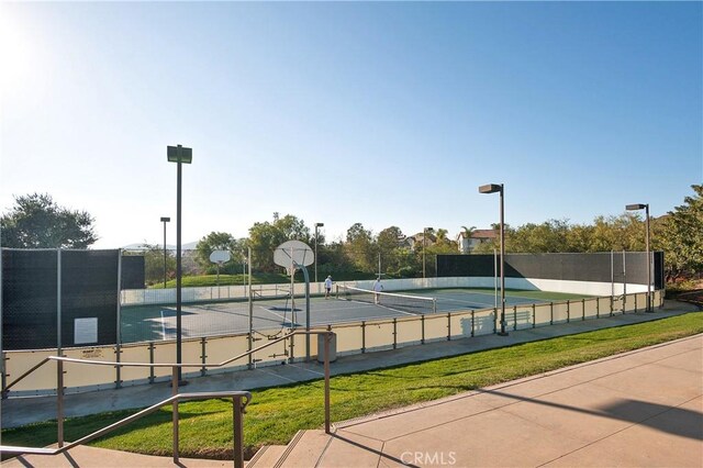 view of sport court featuring basketball court