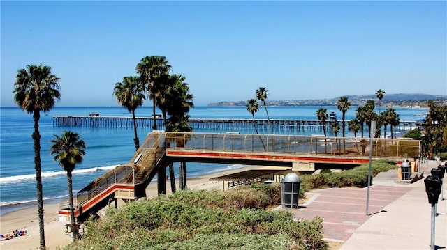 surrounding community with a water view